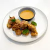 Country-Fried Strip Steak Bites with Hot Sauce White Gravy
